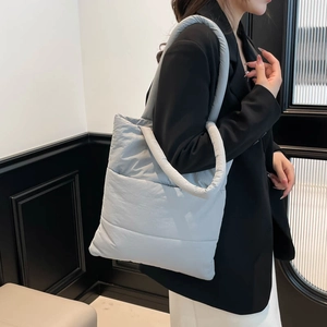 Quilted puffer tote bag in light grey, large capacity padded shoulder bag for travel