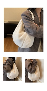 Detail of white faux fur tote bag showing plush texture, leather strap, and gold metal hardware