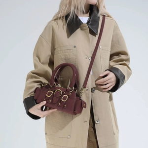 French retro burgundy leather mini crossbody bag with gold buckles and dual top handles