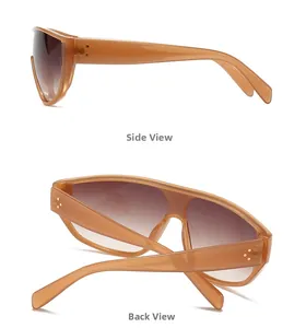 Vues détaillées de lunettes de soleil ambre oversize avec accents dorés et verres marrons