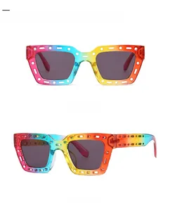 Detail of square gradient sunglasses with hollow frames and dark grey lenses in 45-degree view
