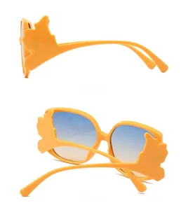 Detailed side and back view of orange irregular flame frame sunglasses with gradient lenses