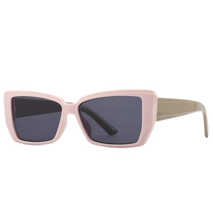 Retro cat-eye oversized sunglasses with pink frames and khaki temples for women