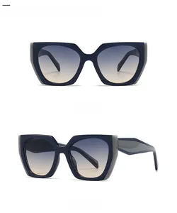 Front and profile views of bold oversized square cat-eye sunglasses in blue-gray finish