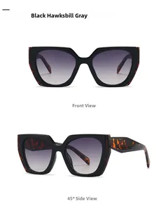 Front and 45-degree views of oversized black hawksbill sunglasses with gradient gray lenses