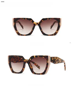 Detailed front and side views of leopard grain tea oversized sunglasses with gradient lenses