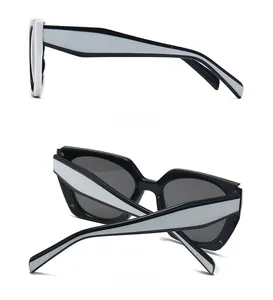 Side and back view of black sunglasses with gray lenses and unique color-block temples