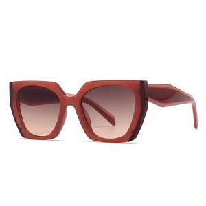 Square oversized sunglasses with thick brick red frame and gradient brown lenses