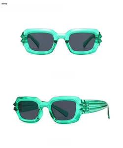 Front and side view of modern green sunglasses with textured temples and gray lenses