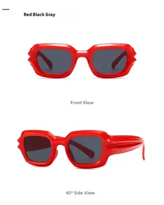 Front and side view of red wavy lip-shaped frame sunglasses with dark grey lenses