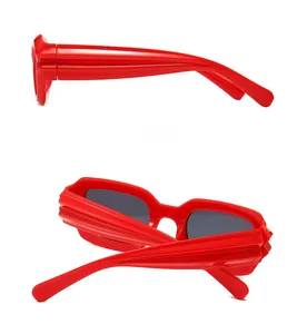 Detailed side and back views of red rectangular sunglasses with grooved temples