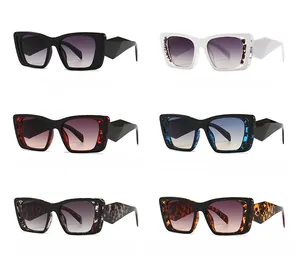 Vue détaillée de six lunettes de soleil œil-de-chat avec montures géométriques colorées
