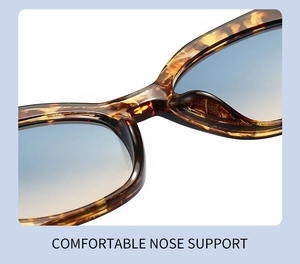Gros plan du support de nez intégré confortable sur des lunettes de soleil en écaille