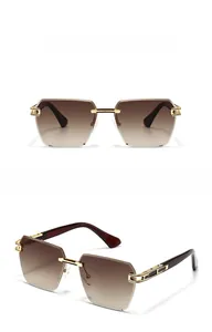 Detail view of gold metal hinges and gradient tea lenses on rimless sunglasses