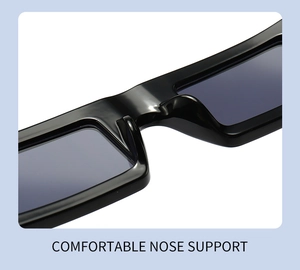 Detail showing the comfortable nose support and glossy black frame of square sunglasses