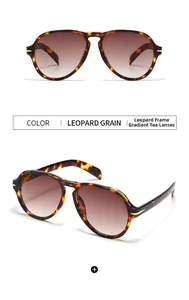 Close-up of leopard grain pilot sunglasses with gradient tea lenses and metal accents