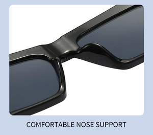 Macro detail of comfortable integrated nose support on black thick frame sunglasses