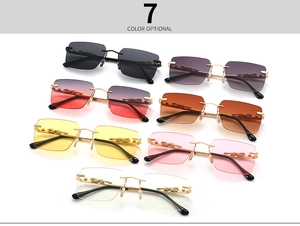 Detail view showing seven color options of rimless sunglasses with gold leopard decoration
