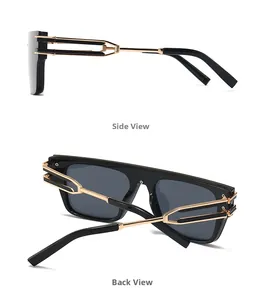 Detail view of black square sunglasses with golden hollow metal accents on the temples