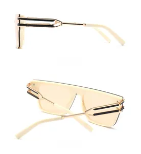 Side and back view of retro ivory sunglasses with gold metal temples and stripe details
