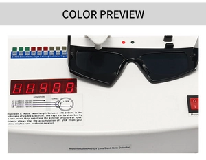 Detailed UV400 protection test for black stylish sunglasses on a testing device