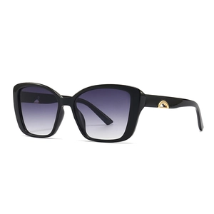 Retro oversized sunglasses with black frames, purple gradient lenses and gold metal accents