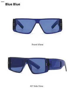 Macro-opname van de blauwe oversized vierkante zonnebril met brede poten en zijramen