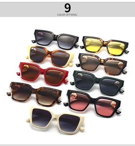 Detailed grid of oversized square sunglasses featuring various frames and gold logo details
