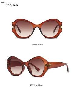 Detailansicht der Retro-Cat-Eye-Sonnenbrille mit braunen Verlaufsgläsern und Goldakzenten