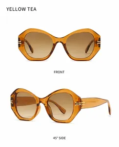 Kantige Cat-Eye-Sonnenbrille in Teegelb mit goldenen T-Akzenten in Front- und Seitenansicht