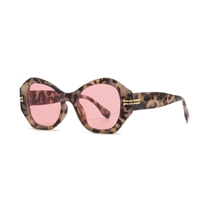 Schicke Schildpatt-Polygon-Sonnenbrille mit rosa Gläsern und goldenen Metallakzenten