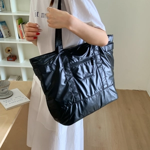Black high-gloss puffy tote bag with quilted pattern and large capacity for daily commute