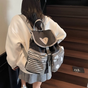 Japanese style black and white patchwork canvas backpack with heart patch and contrast pockets