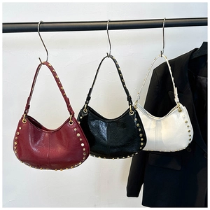Three vintage hobo bags with metallic studs in burgundy, black, and white colors