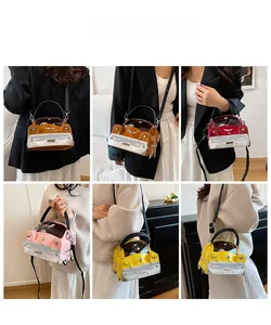 Detailed views of creative car-shaped handbags in multiple colors worn by a model