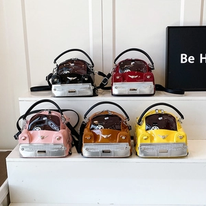 Quirky car-shaped leather handbags in five colors with top handles and shoulder straps