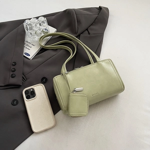 Minimalist light green baguette shoulder bag with mini coin purse for daily commute