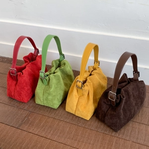 Ruched suede dumpling bags in four colors with leather shoulder straps and metal buckles