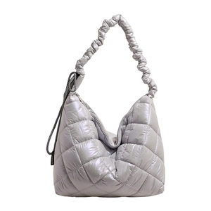 Quilted down cotton tote bag in metallic silver with cloud ruffled shoulder strap