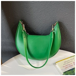 Detailed top view of a green crescent hobo bag with gold hardware and fine leather texture