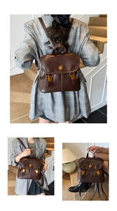 Detail of dark brown retro leather backpack with gold clasp on indoor stairs