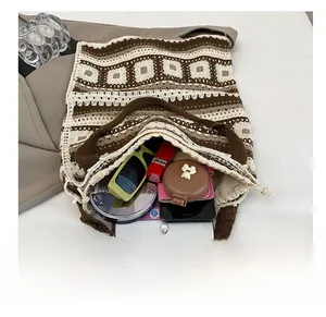Internal view of crochet knit tote bag showing spacious capacity for essentials