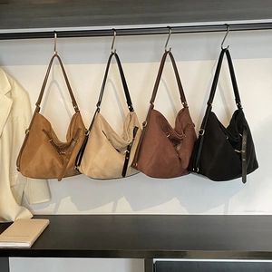 Retro frosted suede shoulder bags in multiple colors with metallic rivets and adjustable straps