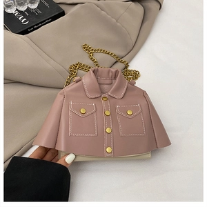 Detail of pink blazer-style crossbody bag with metallic buttons and chain strap