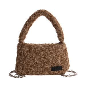 Brown fluffy plush handbag with silver chain strap and logo tag for women