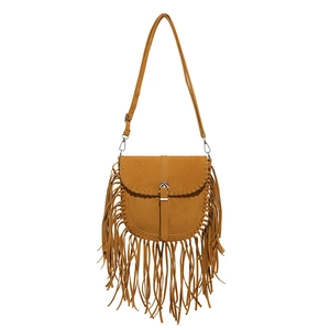 Handmade faux suede saddle bag in mustard yellow with fringe and adjustable strap