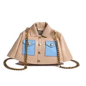 Unique jacket-shaped beige shoulder bag with blue pockets and gold chain strap