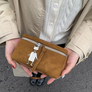 Brown suede crossbody square bag with unique silver robot pendant and zipper closure