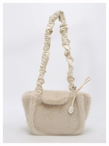 Detailed view of beige faux fur shoulder bag with stylish ruched PU leather strap