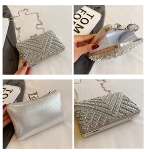 Detail view of silver rhinestone clutch bag with chain strap and interior storage
